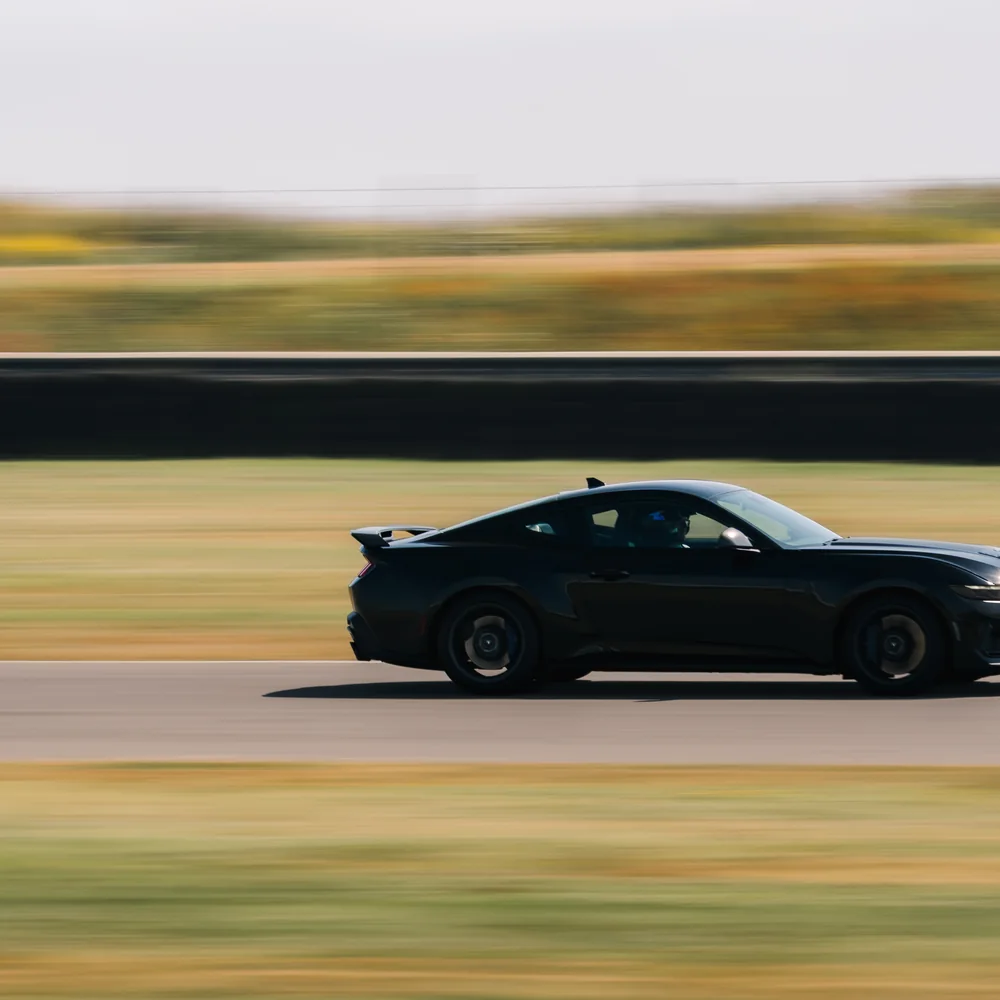 Car on circuit at a Driven+ Anglesey trackday, photo 3