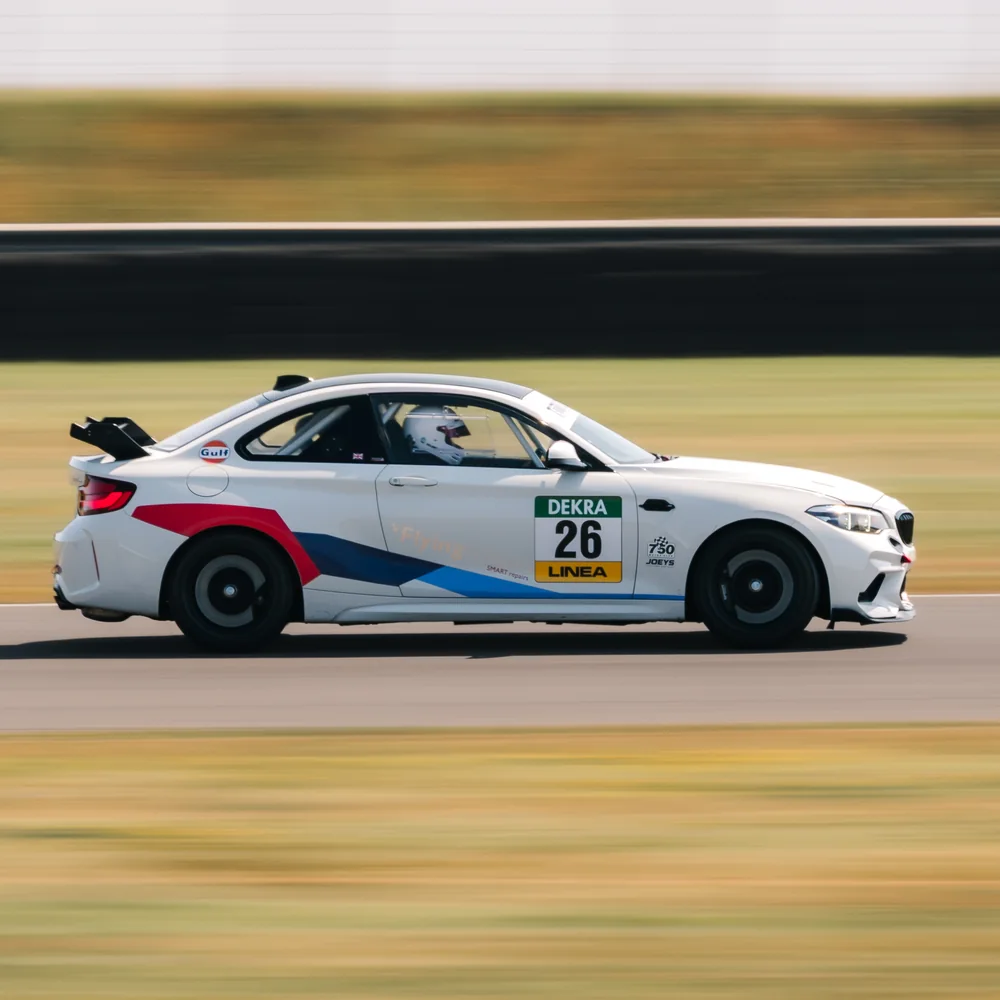 Car on circuit at a Driven+ Anglesey trackday, photo 9