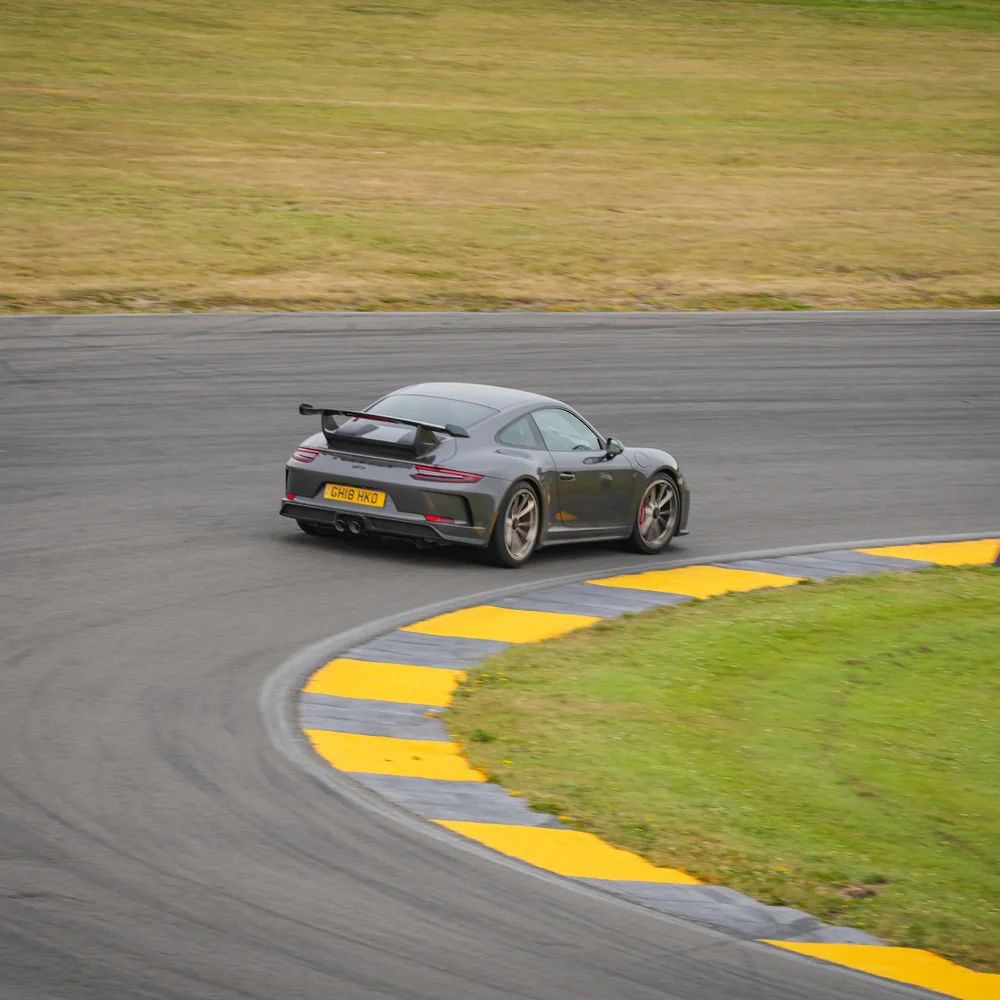 Car on circuit at a Driven+ Anglesey trackday, photo 23
